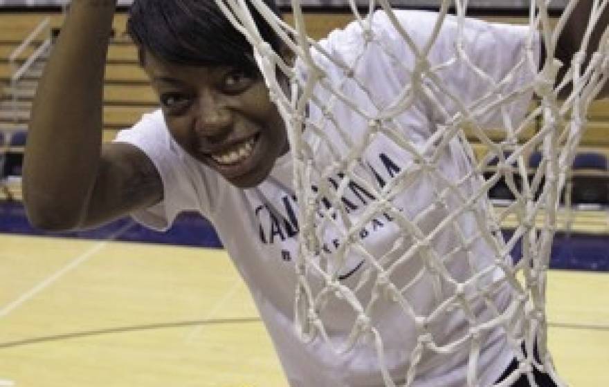 Rogers with basketball hoop