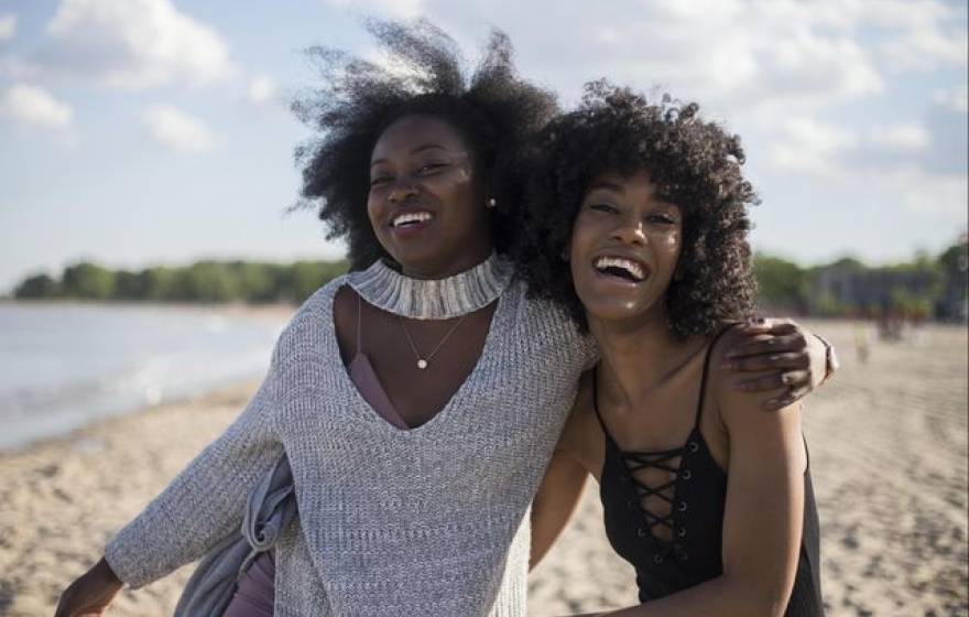 Two women laughing