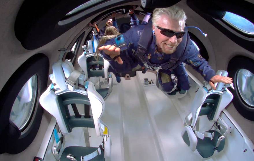 Sir Richard Branson is weightless in space on his Virgin Galactic passenger rocket plane.