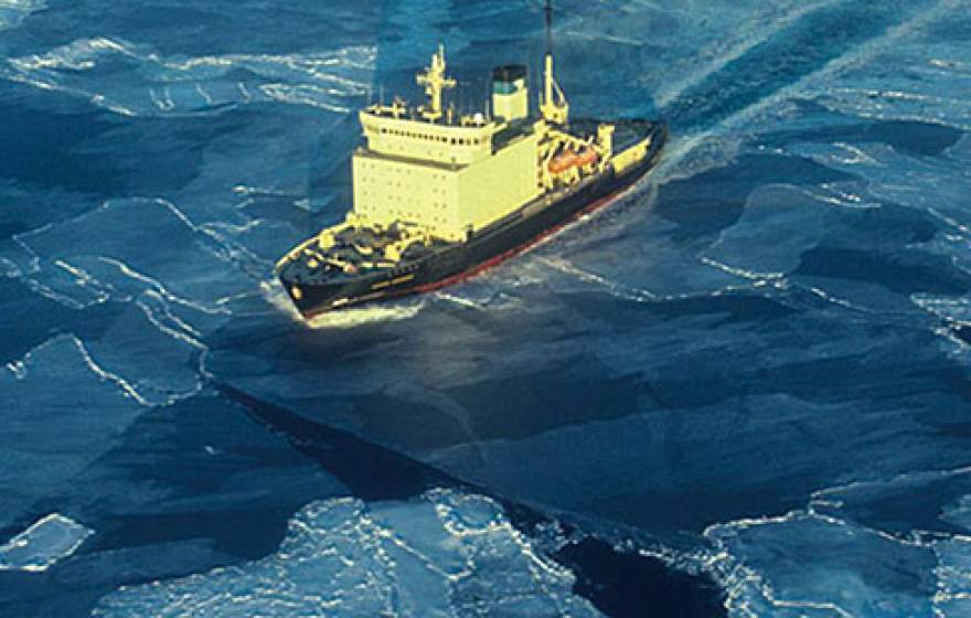ship sailing through polar ice