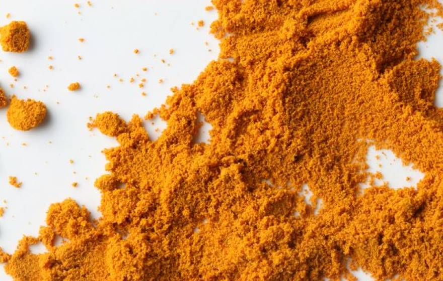 Powdered tumeric, the spice that contains curcumin. 