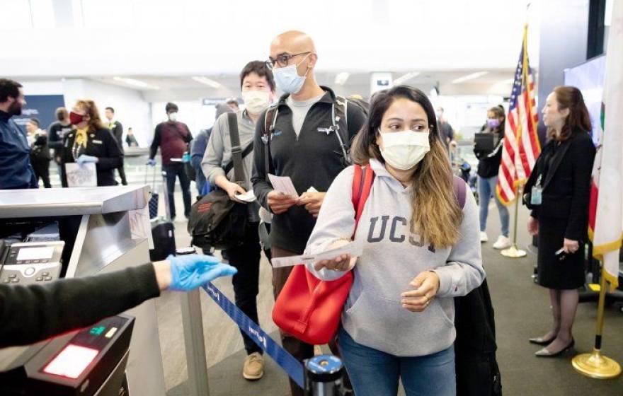 UCSF health workers at the airport, en route to New York City
