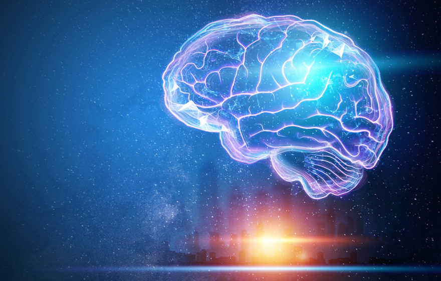 Glowing, translucent digital brain outlined in purple and blue light floating against a dark, star-filled background, with a bright sunrise or light flare near a distant city skyline below.
