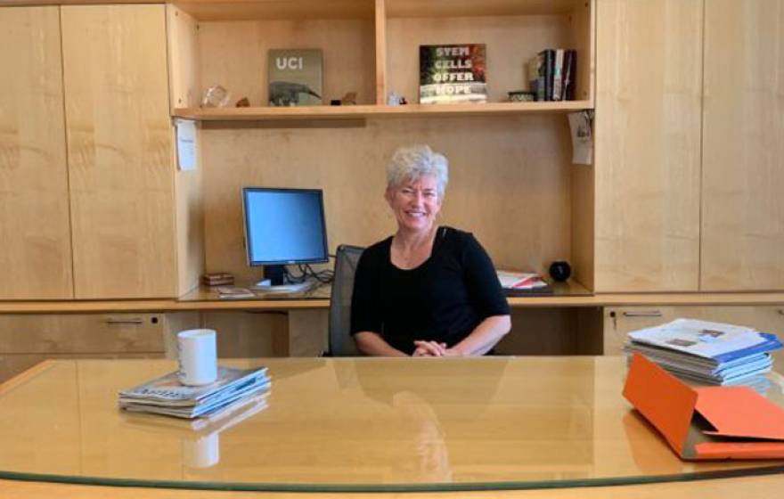 Aileen Anderson at her desk