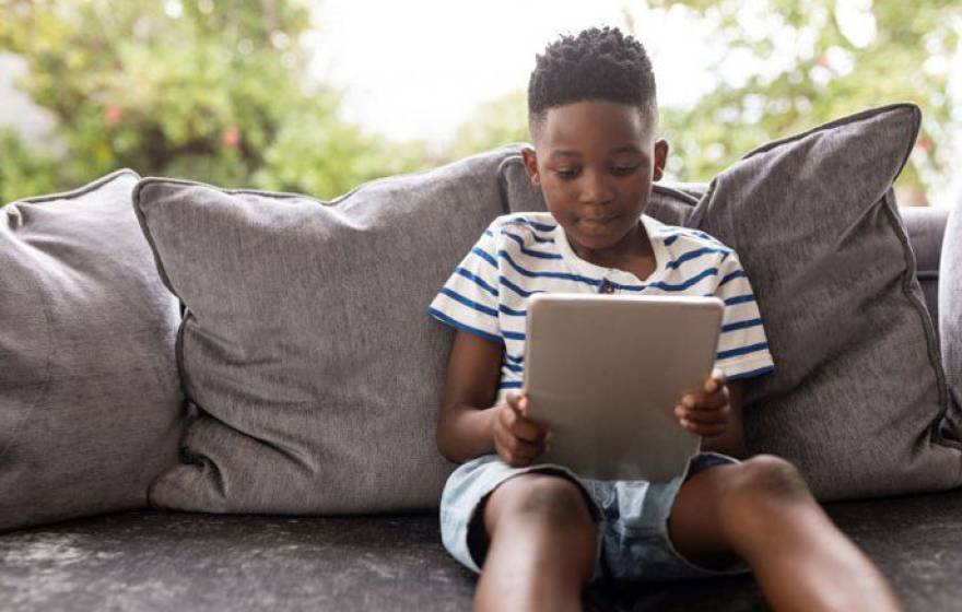 Boy holding tablet