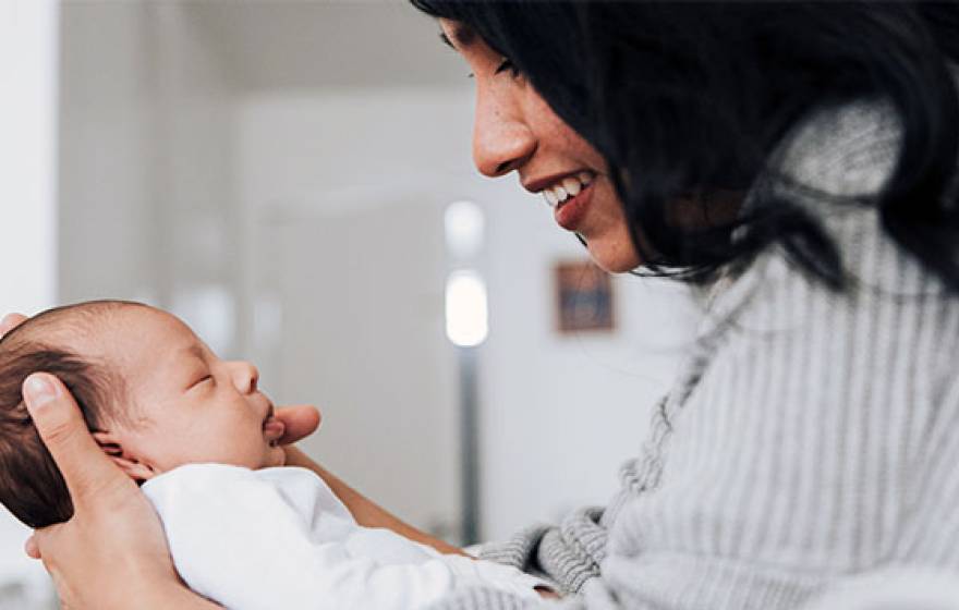 Woman looking at child