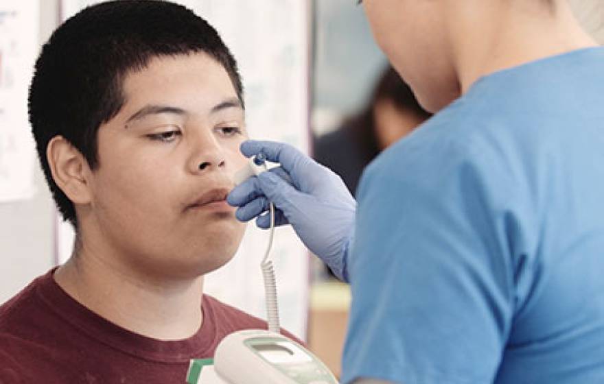 boy gets health exam