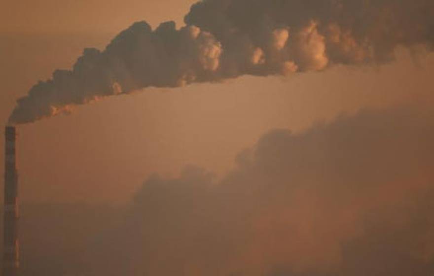 A smokestack plant emitting CO2