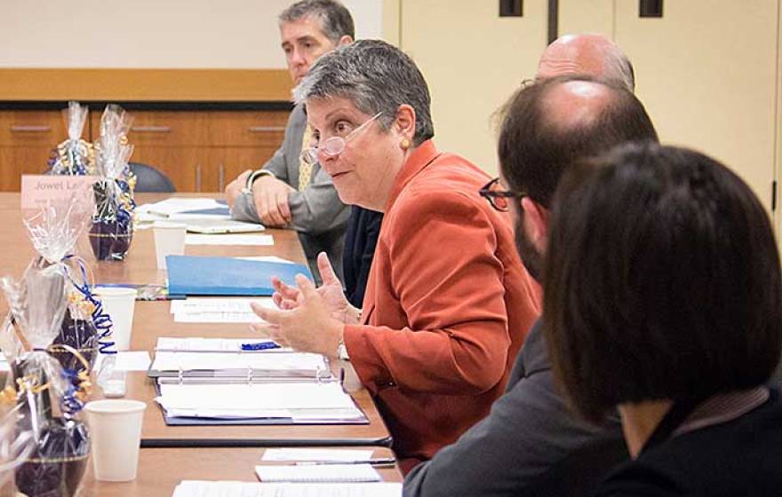 Janet Napolitano and community college officials