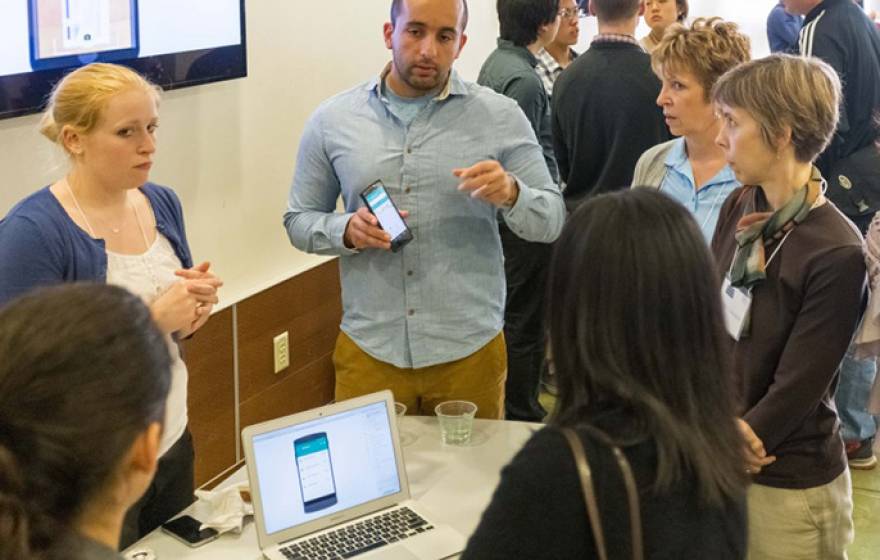 Members of Snapily explain their app at the CITRIS Mobile App Challenge at UC Berkeley.