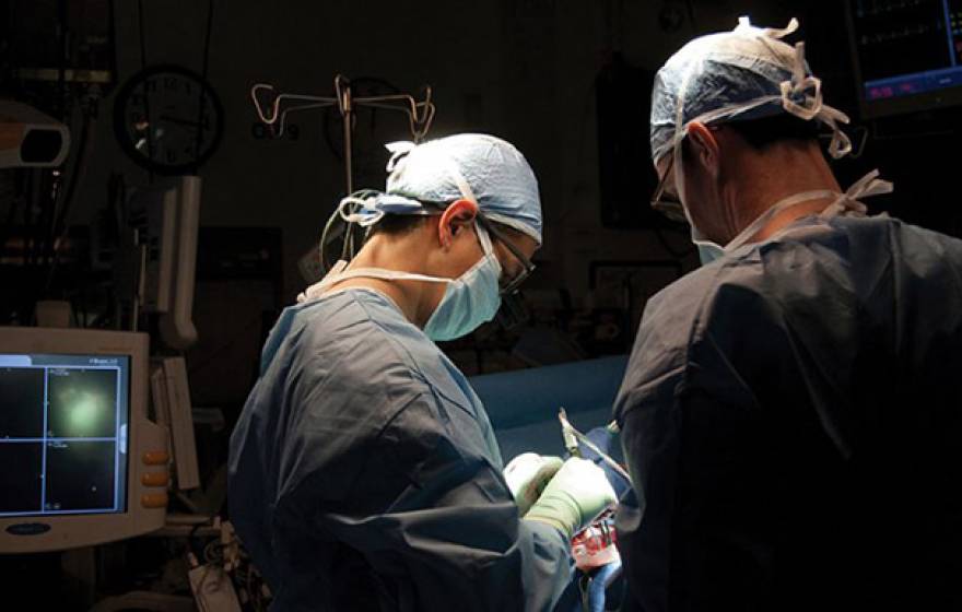 Neurosurgeon Eddie Chang operates on a patient with epilepsy. Chang’s team is mapping the regions of the brain that trigger seizures while also studying the circuits that mediate mood.