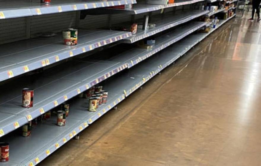 Nearly empty shelves in a store