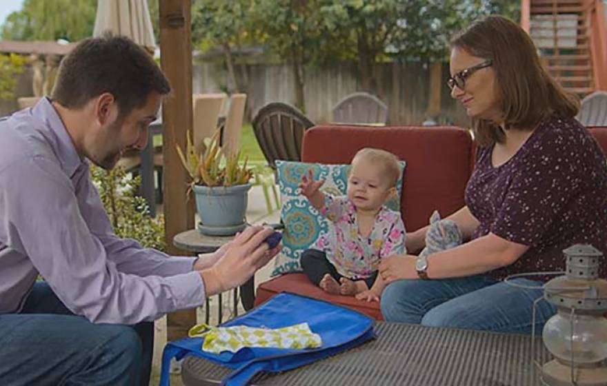 Professor Eric Walle with Penelope and her mom, Jessica Mohatt, in a scene from the new Netflix docu-series "Babies."
