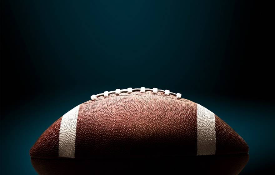 Football on a black background