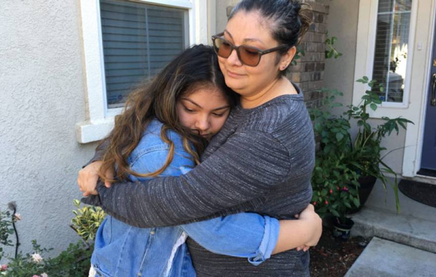 Garcia family in a hug