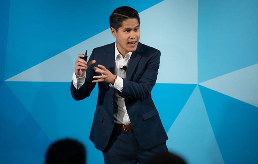 Kevin Pham gives a Grad Slam presentation in 2019