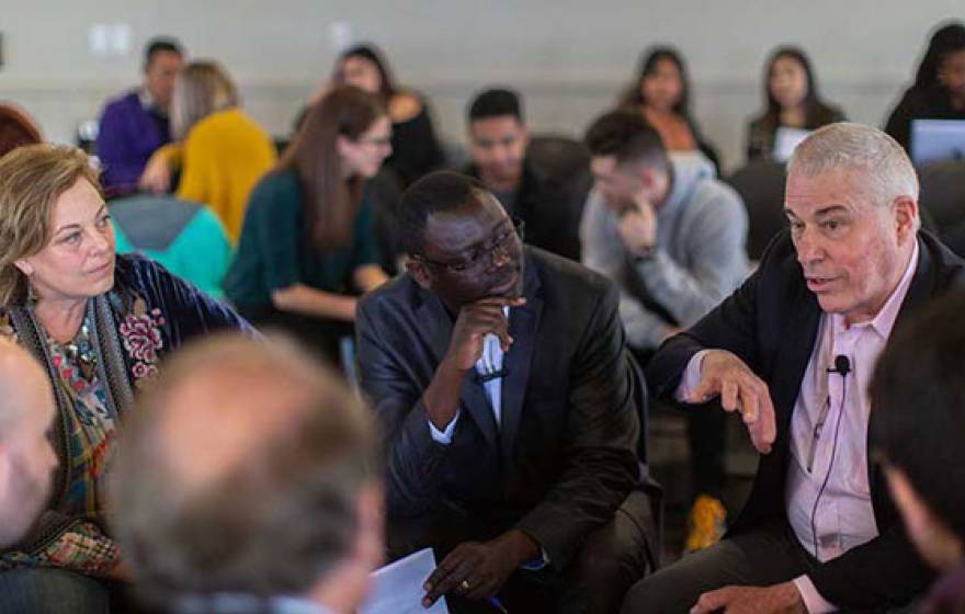 Three people in a workshop circle