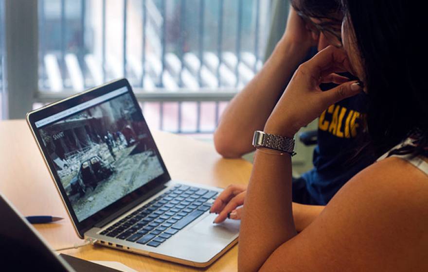 Person watching a video on a computer