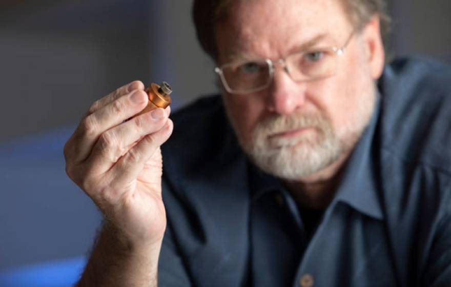 Chris Barty holds up Blu-ray diode