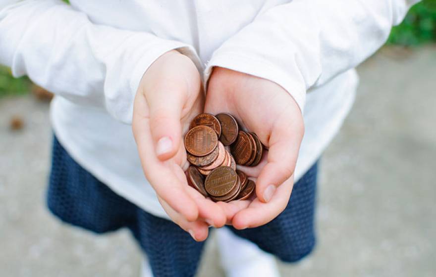 girl with pennies