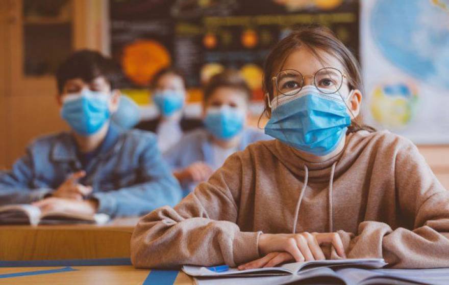 Kids in a classroom in masks