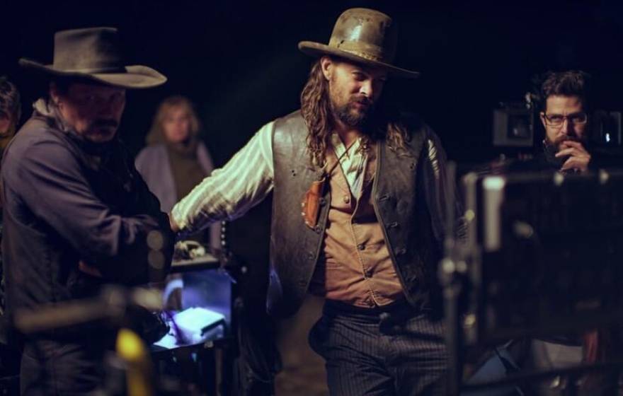 Bearded Jason Momoa in Western clothes on the set of his new movie The Last Manhunt