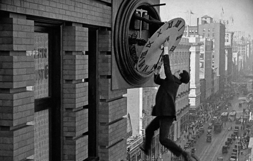 Harold Lloyd dangling from a clock in the film Safety Last