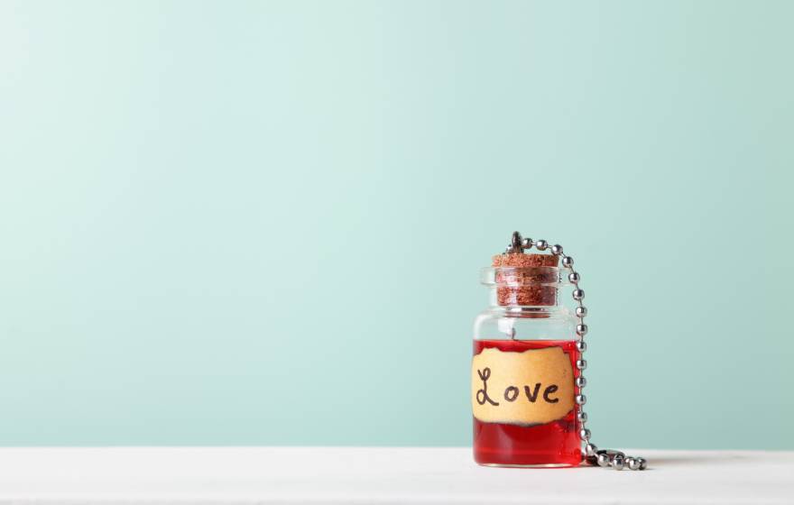 A little potion bottle that says Love