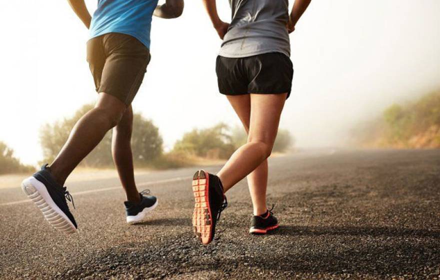 Man and woman jogging together