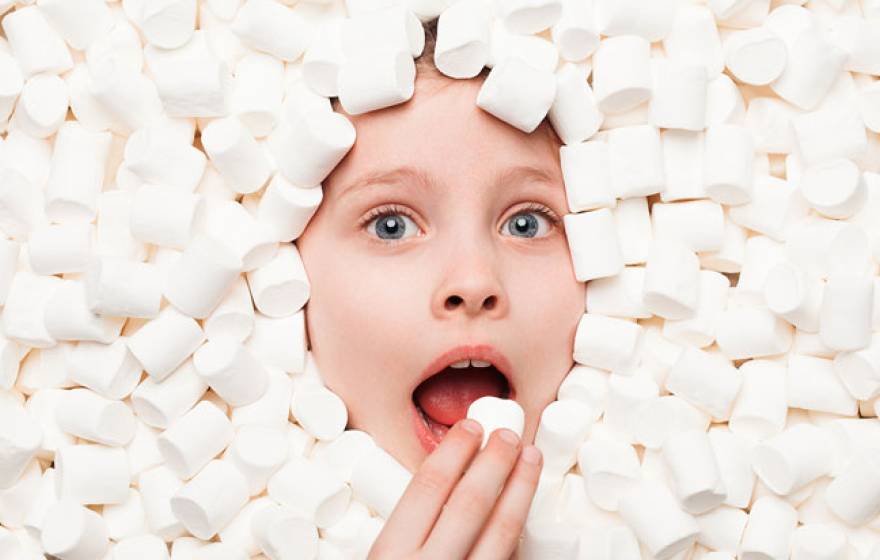 Boy in a pile of marshmallows