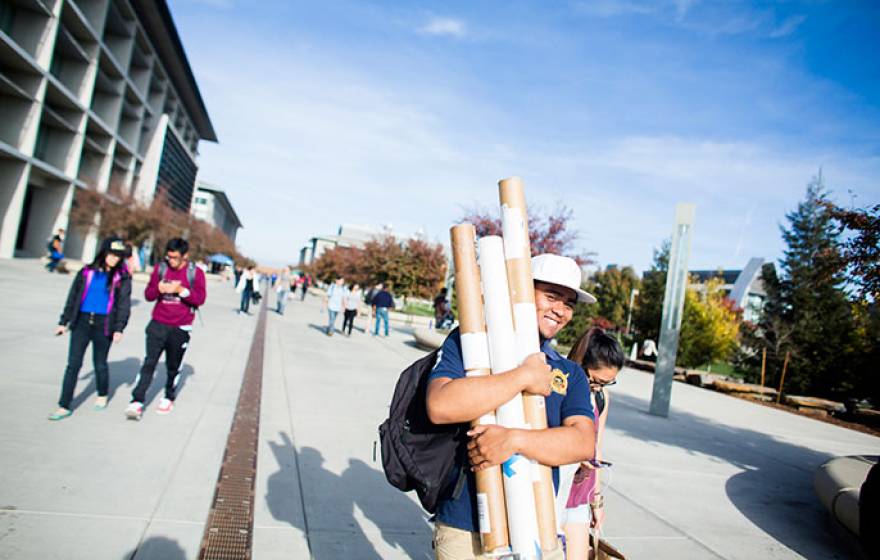 students walking on UC Merced campus