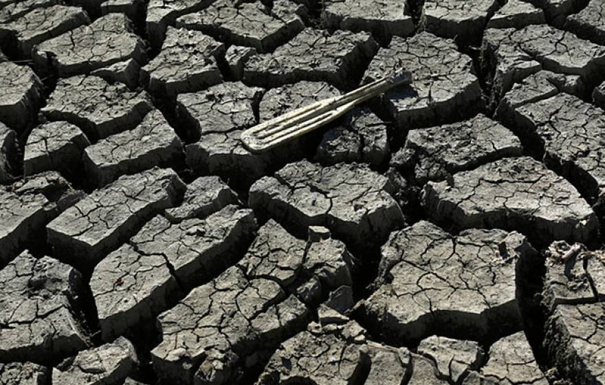 oar sits atop parched earth