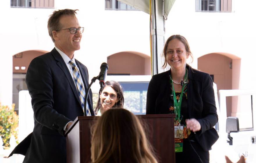 AVP of Energy and Sustainability David Philips and Katie Maynard at the award ceremony for the sustainability champion