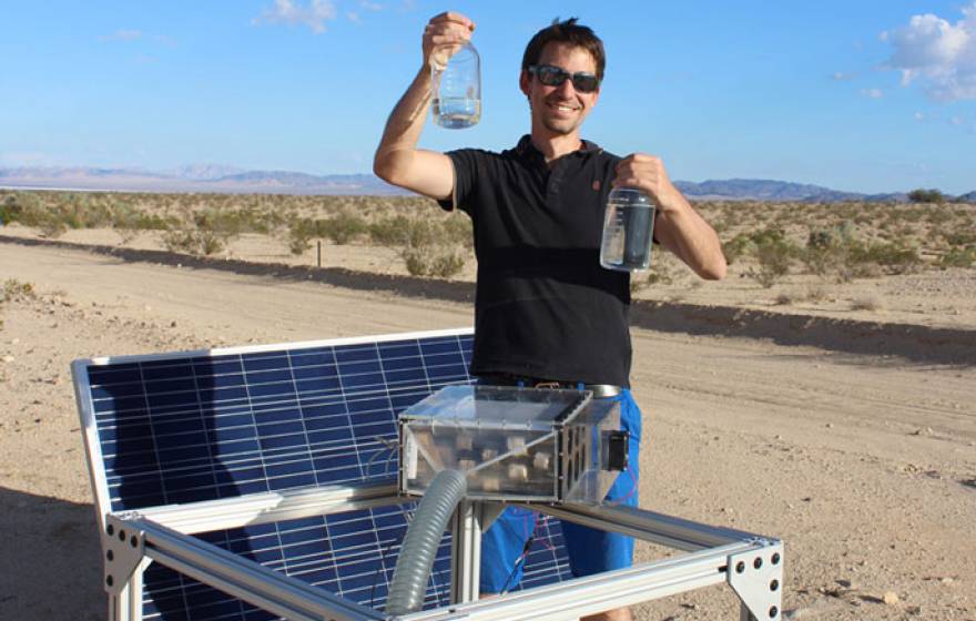 Mathieu Prévot displays water collected by the harvester