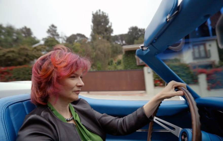 Rachelle Crosbie-Watson driving her Corvette