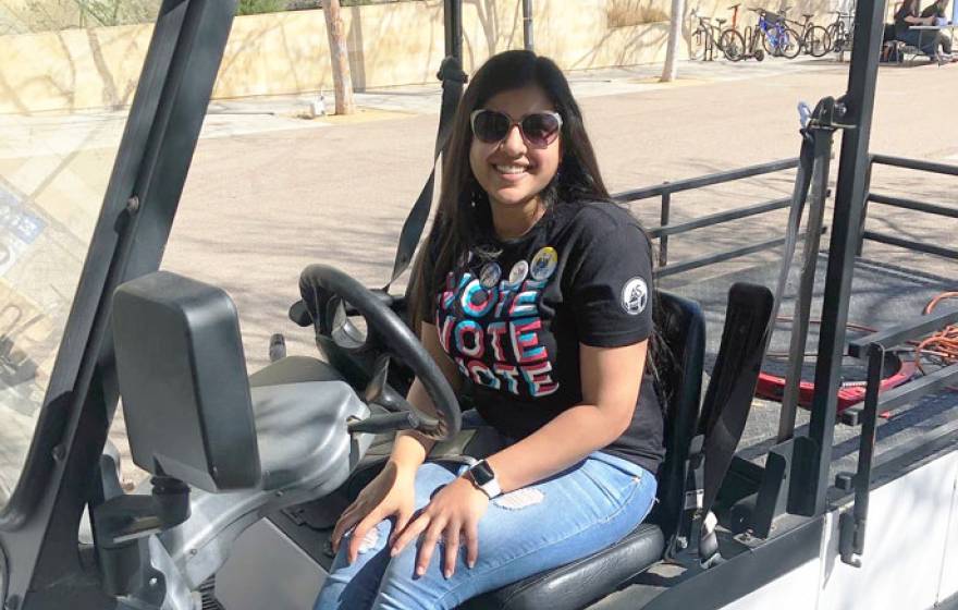 Alisha Saxena in golf cart