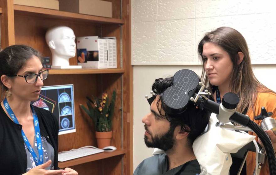 a doctor works with a patient