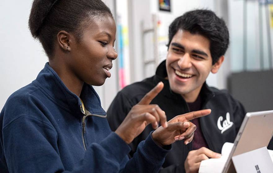 Two students talking together