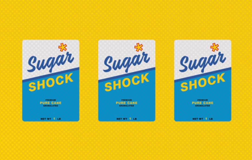 Sugar boxes that say shock in a row