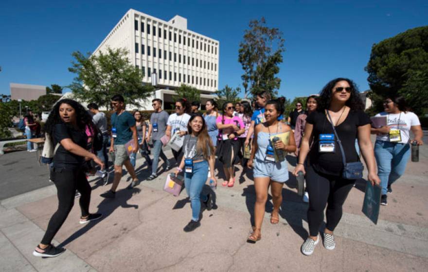 Students walking on the UC Irvine campus