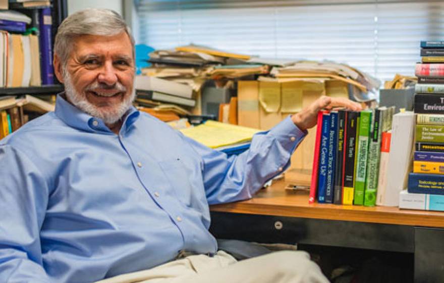 Carl Cranor with his books