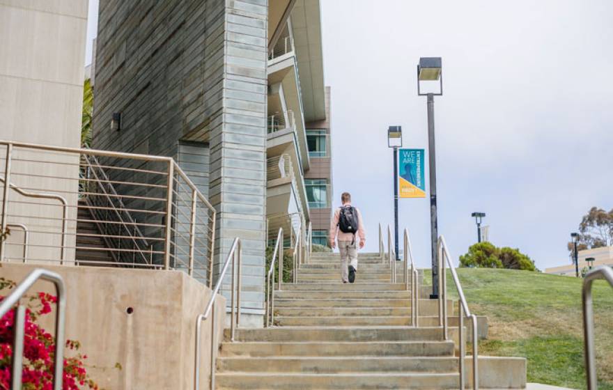 Lone students walks UC San Diego campus