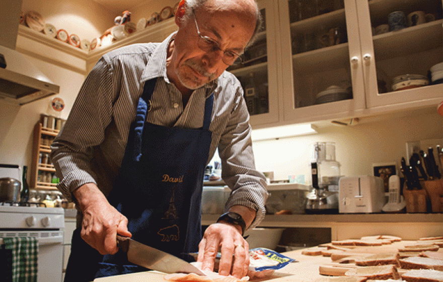 Starting around 5 a.m., David Kessler assembles sandwiches at his kitchen in the Oakland hills. 