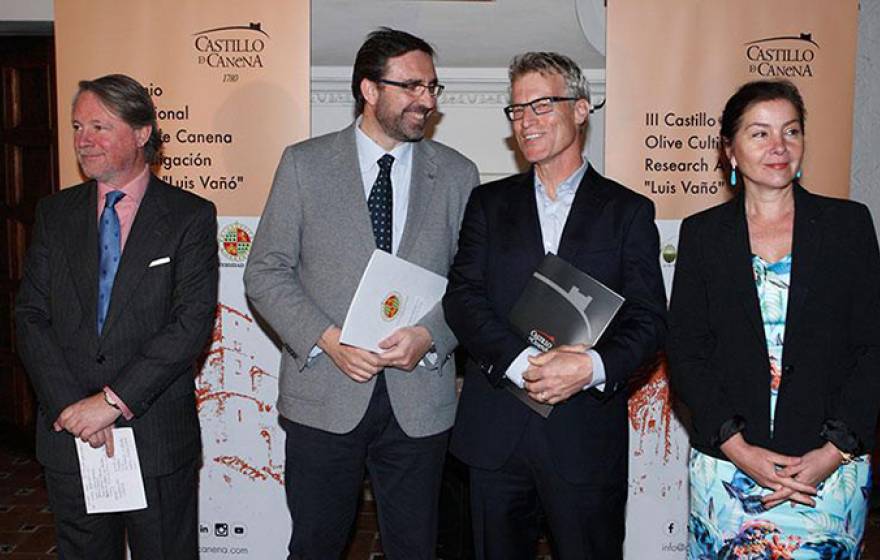 The UC Davis Olive Center’s Dan Flynn, second from right, stands alongside Juan Gómez, rector of the University of Jaén, during the award ceremony in Castillo de Canena, the castle after which the olive oil company is named. Also pictured are company owne