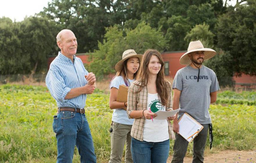 UC Davis Student Farm Director Mark Van Horn and some of his students last year, from left, Alexis Fujii, Mary Laurie and Abraham Cazares. 