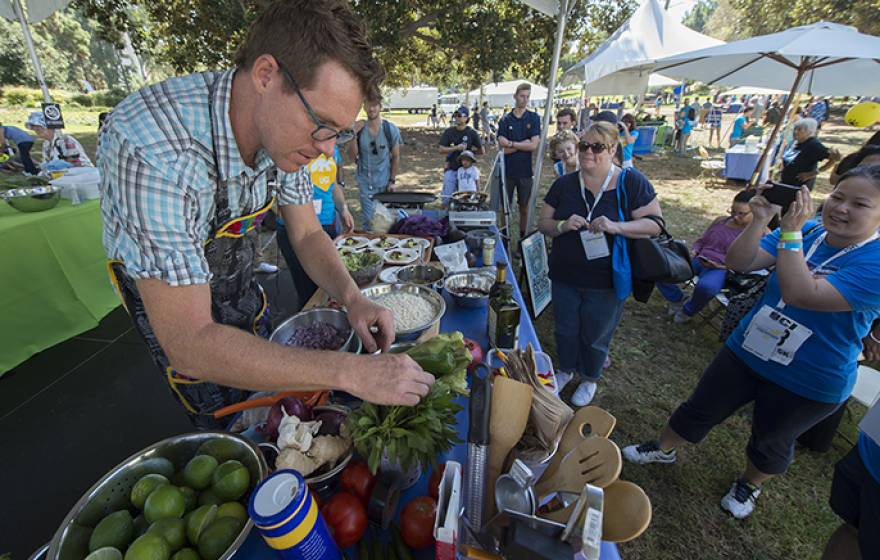 Visiting eco-chef Roger Feely makes grasshopper tacos during a demonstration of drought-friendly cooking at Festival of Discovery in Aldrich Park. 