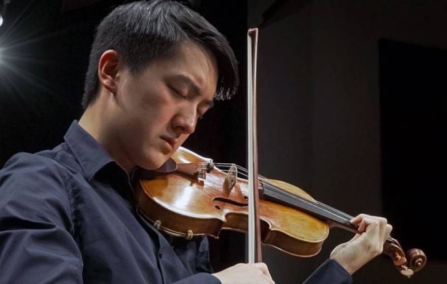 Elvin Hsieh playing the Stradivarius violin that was already owned by UCLA