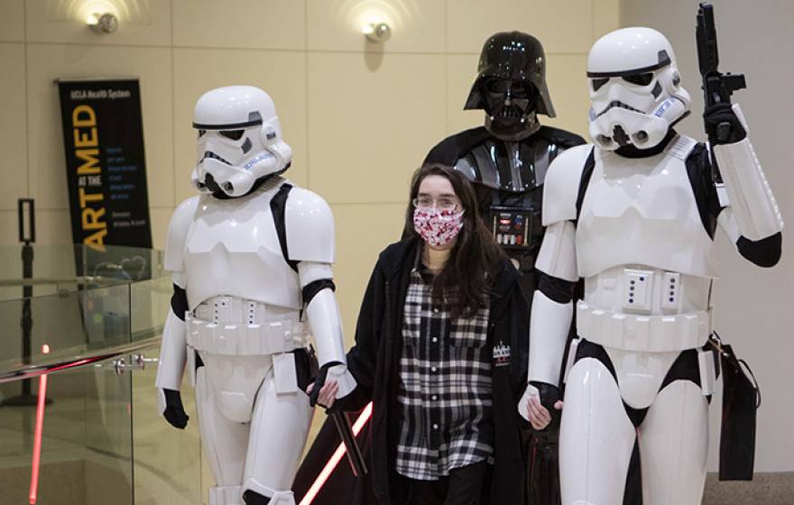 Following a lung transplant, Kathlyn Chassey makes a triumphant exit from the Reagan UCLA Medical Center on Wednesday, Jan. 11, accompanied by Darth Vader and storm troopers from "Star Wars."