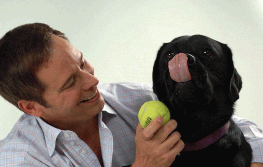 Entrepreneur Michael Landa, a UCLA Anderson School of Management alumnus, and his Labrador retriever