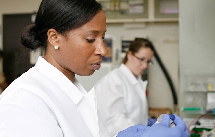 UCLA School of Nursing assistant professor and researcher Nalo Hamilton works in her lab.